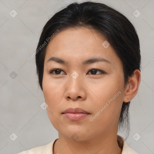 Neutral asian young-adult female with medium  brown hair and brown eyes