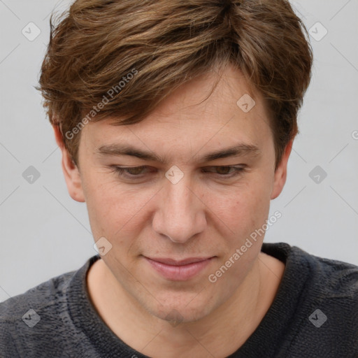 Joyful white adult male with short  brown hair and grey eyes