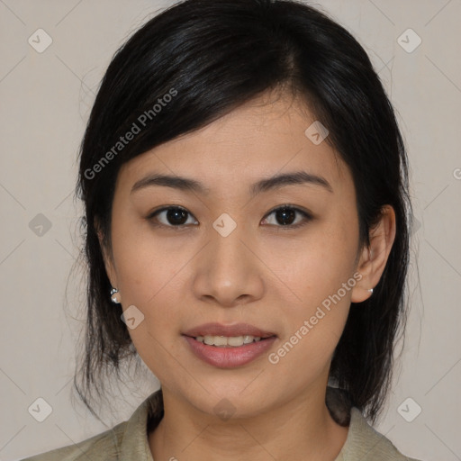 Joyful asian young-adult female with medium  brown hair and brown eyes