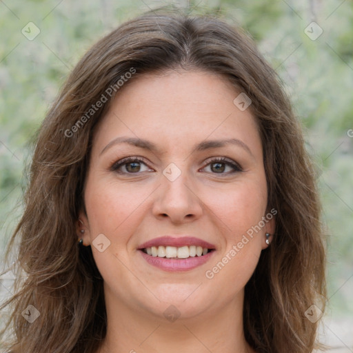 Joyful white young-adult female with long  brown hair and green eyes