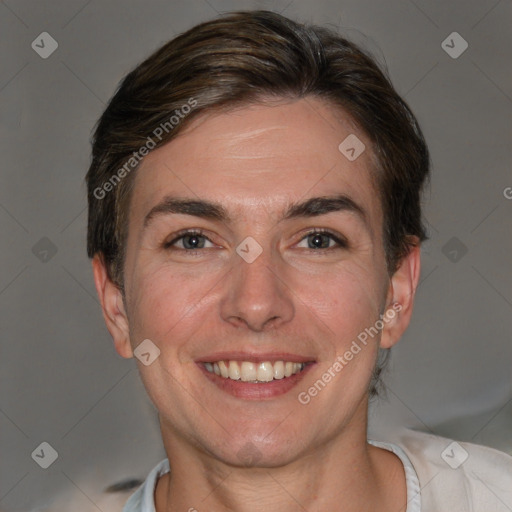 Joyful white adult female with short  brown hair and brown eyes