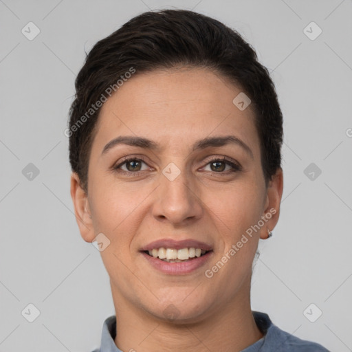 Joyful white young-adult female with short  brown hair and brown eyes