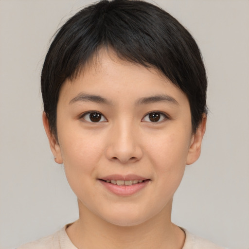 Joyful asian young-adult female with short  brown hair and brown eyes