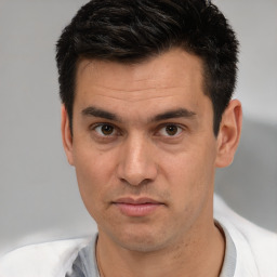 Neutral white adult male with short  black hair and brown eyes