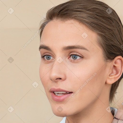 Joyful white young-adult female with medium  brown hair and blue eyes