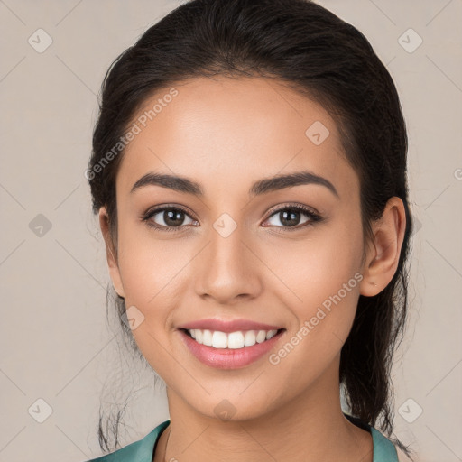 Joyful white young-adult female with long  brown hair and brown eyes