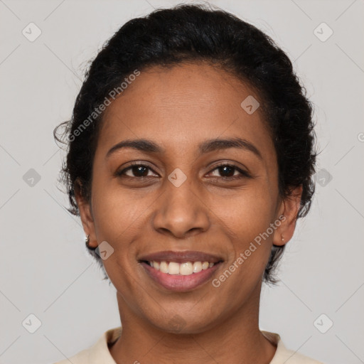 Joyful latino young-adult female with short  brown hair and brown eyes