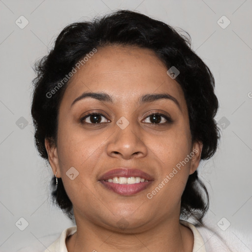 Joyful latino adult female with medium  brown hair and brown eyes