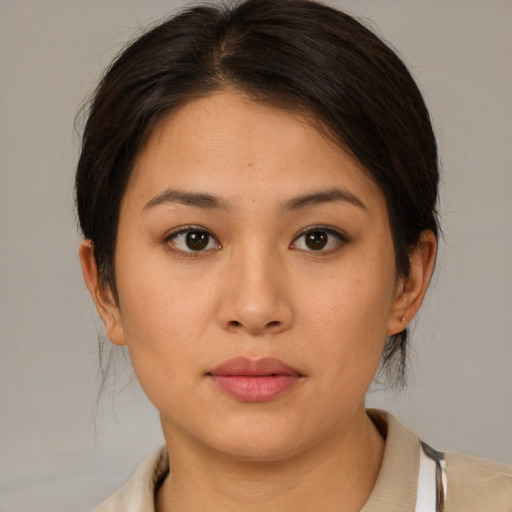 Neutral asian young-adult female with medium  brown hair and brown eyes