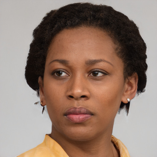Neutral black young-adult female with short  brown hair and brown eyes
