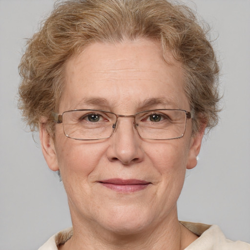 Joyful white middle-aged female with short  brown hair and brown eyes