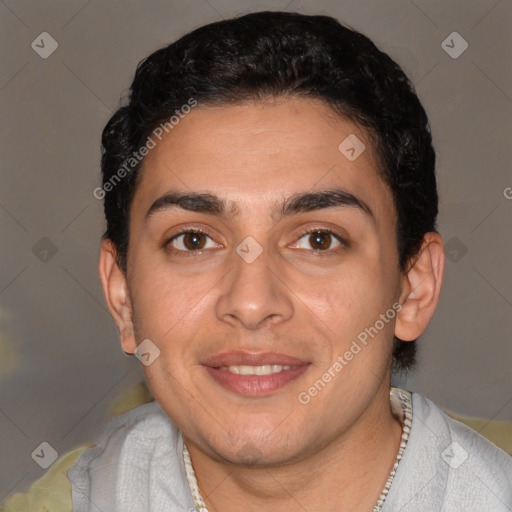 Joyful white young-adult male with short  black hair and brown eyes