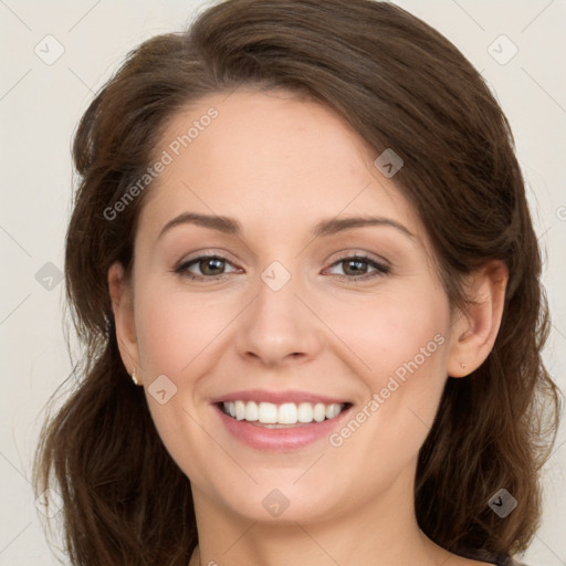 Joyful white young-adult female with medium  brown hair and green eyes