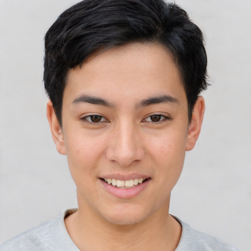 Joyful asian young-adult female with short  brown hair and brown eyes