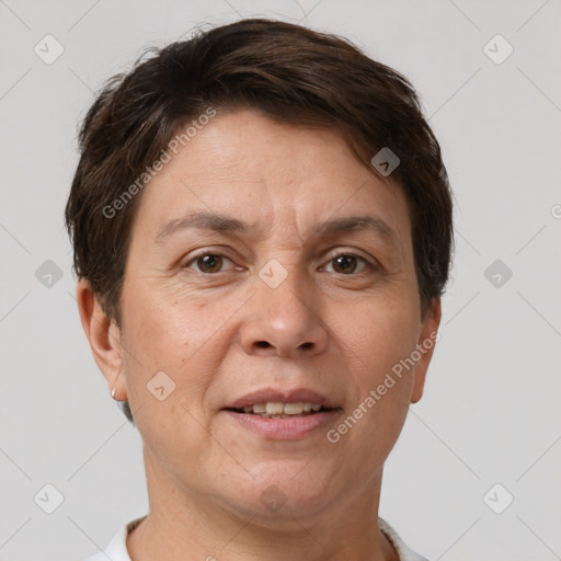 Joyful white adult female with short  brown hair and brown eyes