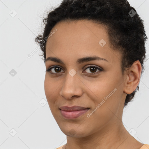 Joyful latino young-adult female with short  brown hair and brown eyes