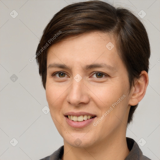 Joyful white young-adult female with short  brown hair and brown eyes