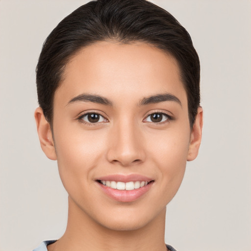 Joyful white young-adult female with short  brown hair and brown eyes