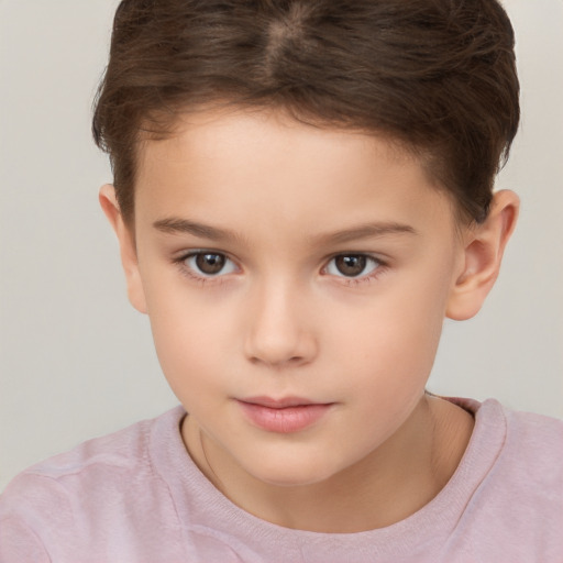 Neutral white child female with short  brown hair and brown eyes