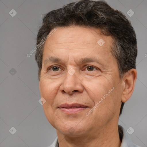 Joyful white middle-aged male with short  brown hair and brown eyes