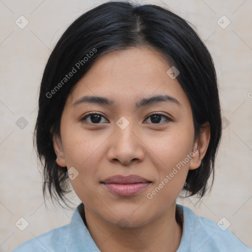 Joyful latino young-adult female with medium  black hair and brown eyes