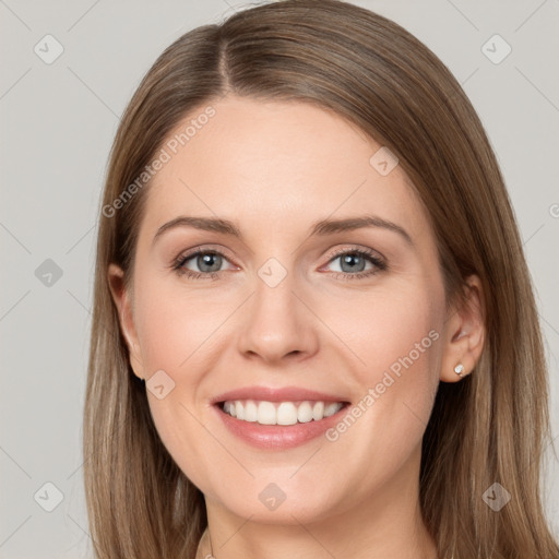 Joyful white young-adult female with long  brown hair and grey eyes