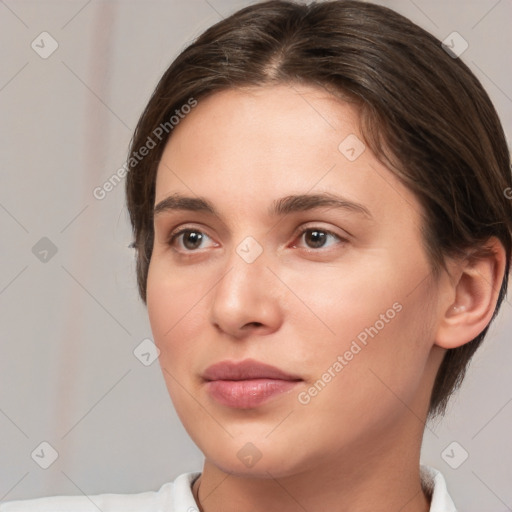 Neutral white young-adult female with medium  brown hair and brown eyes