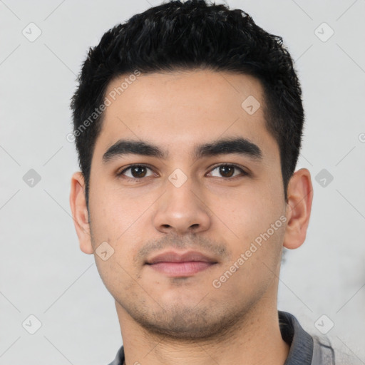 Neutral latino young-adult male with short  black hair and brown eyes