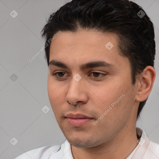 Neutral white young-adult male with short  black hair and brown eyes