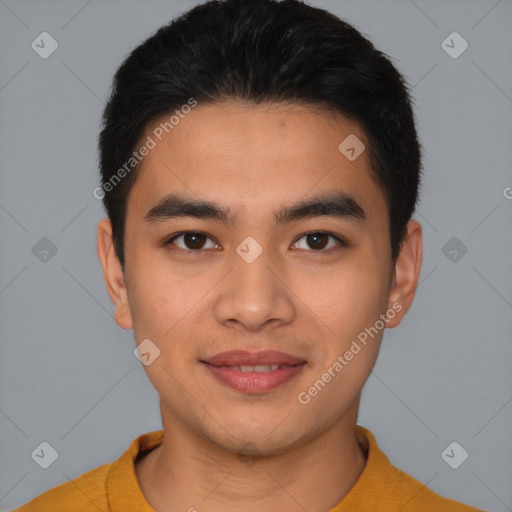 Joyful latino young-adult male with short  brown hair and brown eyes