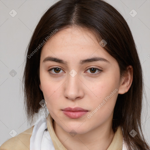 Neutral white young-adult female with medium  brown hair and brown eyes