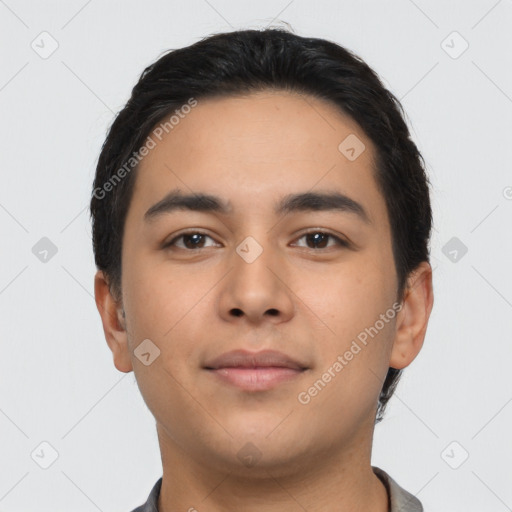 Neutral latino young-adult male with short  black hair and brown eyes