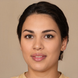 Joyful white young-adult female with medium  brown hair and brown eyes