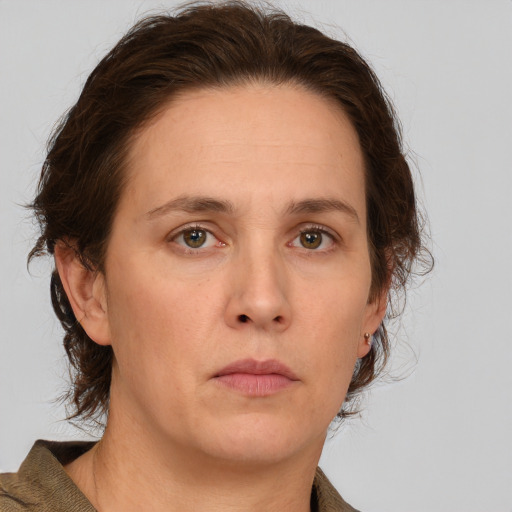 Neutral white adult female with medium  brown hair and brown eyes