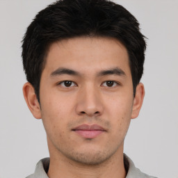 Neutral asian young-adult male with short  black hair and brown eyes