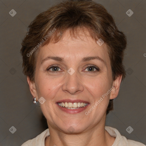 Joyful white adult female with short  brown hair and brown eyes