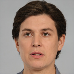 Neutral white adult male with short  brown hair and brown eyes