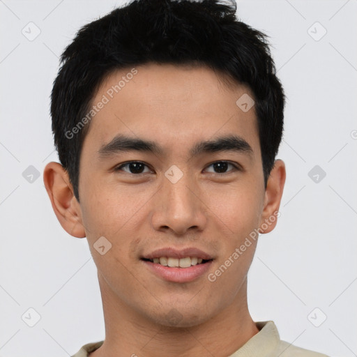 Joyful white young-adult male with short  black hair and brown eyes