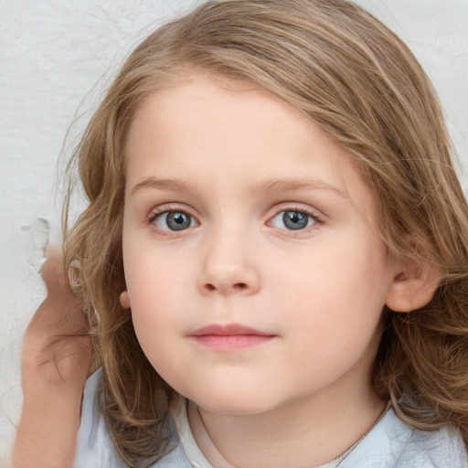 Neutral white child female with medium  brown hair and blue eyes