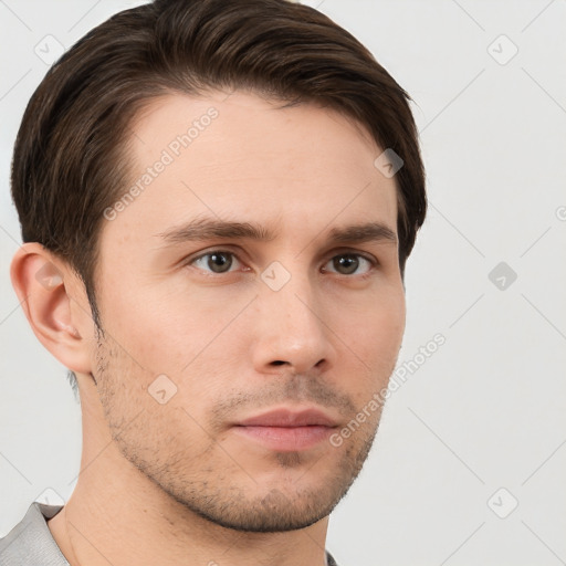 Neutral white young-adult male with short  brown hair and brown eyes