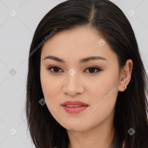 Joyful asian young-adult female with long  brown hair and brown eyes