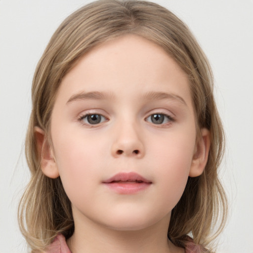 Neutral white child female with medium  brown hair and grey eyes