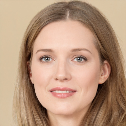 Joyful white young-adult female with long  brown hair and grey eyes