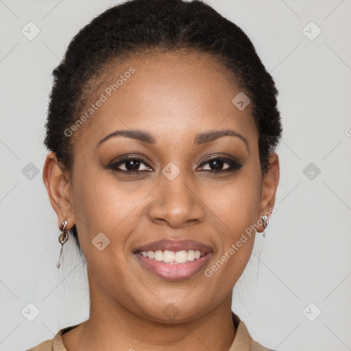 Joyful black young-adult female with short  brown hair and brown eyes