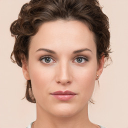 Neutral white young-adult female with short  brown hair and brown eyes