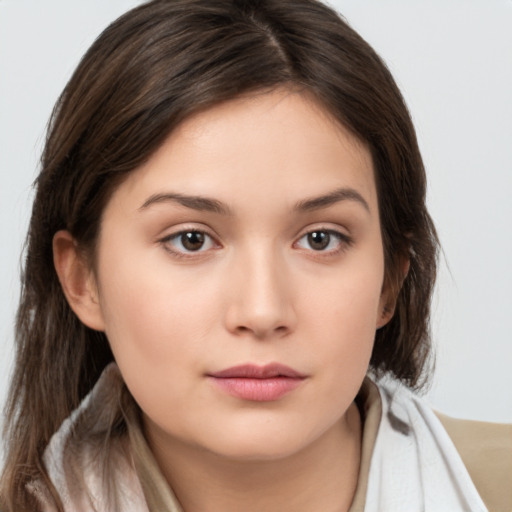 Neutral white young-adult female with medium  brown hair and brown eyes