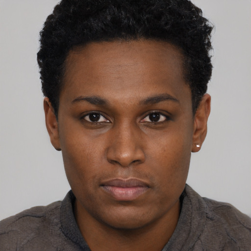Neutral black young-adult female with short  black hair and brown eyes