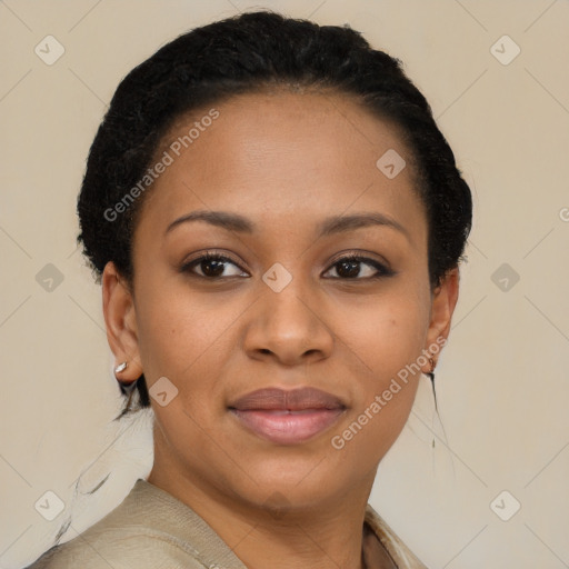 Joyful black young-adult female with short  brown hair and brown eyes