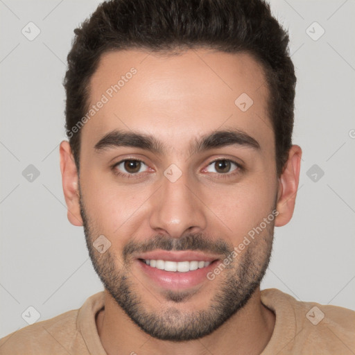 Joyful white young-adult male with short  brown hair and brown eyes