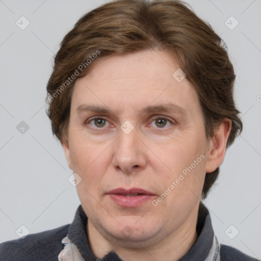 Joyful white adult male with short  brown hair and grey eyes